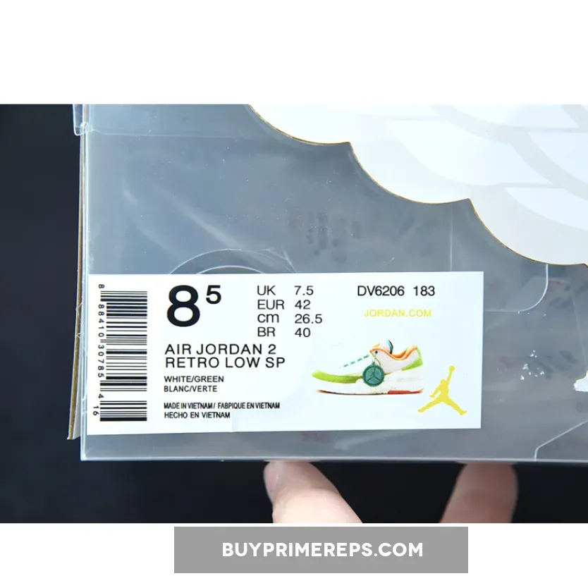 Titan x Air Jordan 2 Low Sail/Safety Orange-Chlorophyll-Coconut Milk